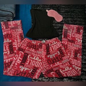 Cuddle up in these soft and comfy pink and white loungewear pajama pants